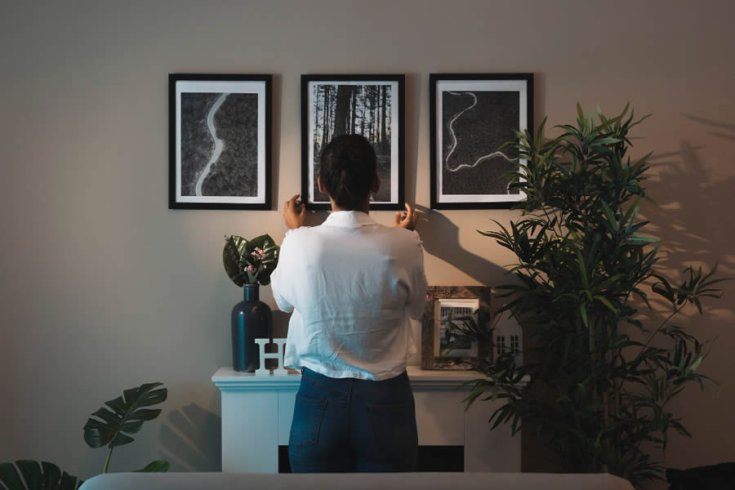The Difference Between DIY and Professional Picture Hanging (It’s More Than You Think)